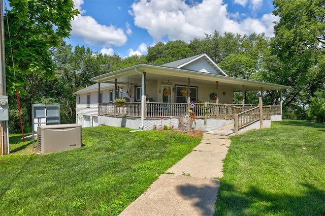 farmhouse with covered porch and a front lawn