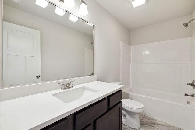 full bathroom featuring vanity, shower / bathtub combination, and toilet