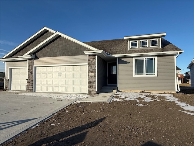 view of front of home featuring a garage