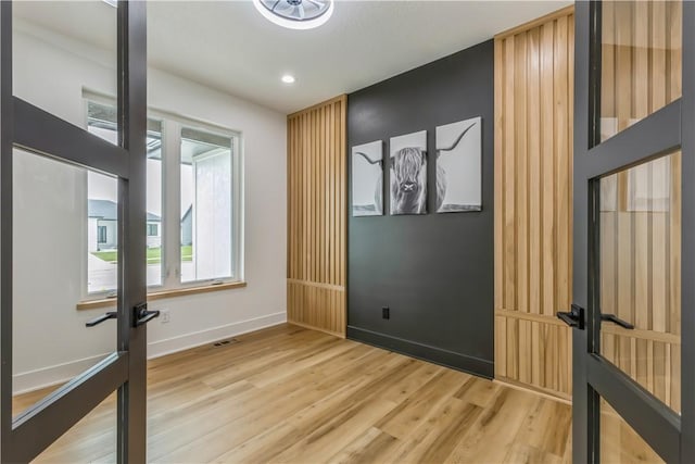 empty room featuring hardwood / wood-style flooring