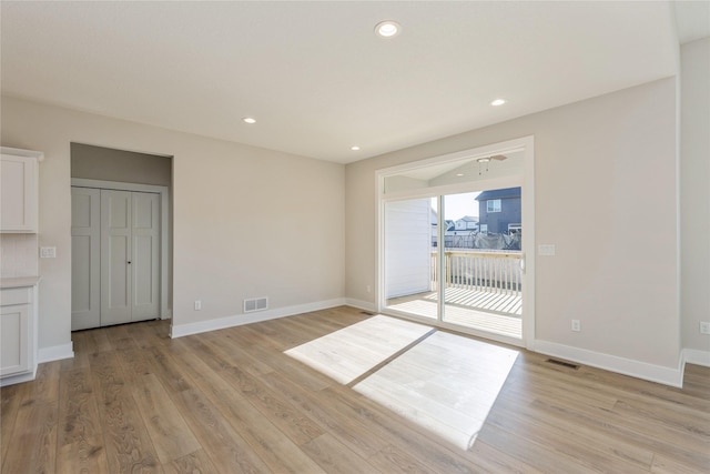 empty room featuring light hardwood / wood-style floors