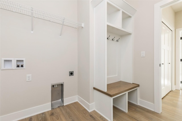 washroom featuring electric dryer hookup, wood-type flooring, and washer hookup