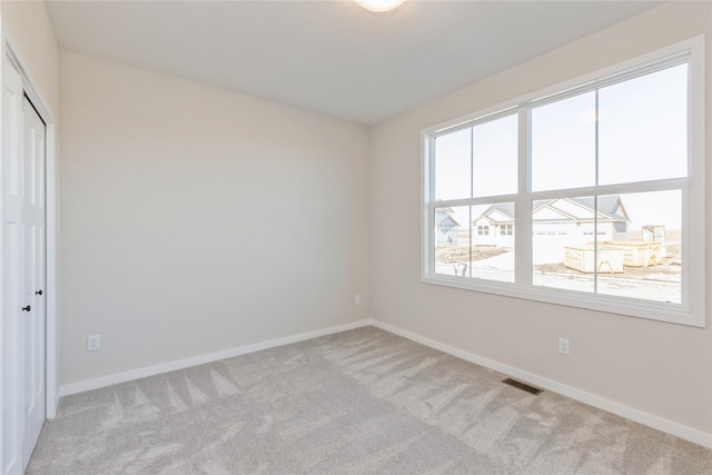 view of carpeted spare room