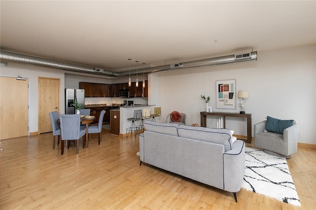 living room with light wood-type flooring