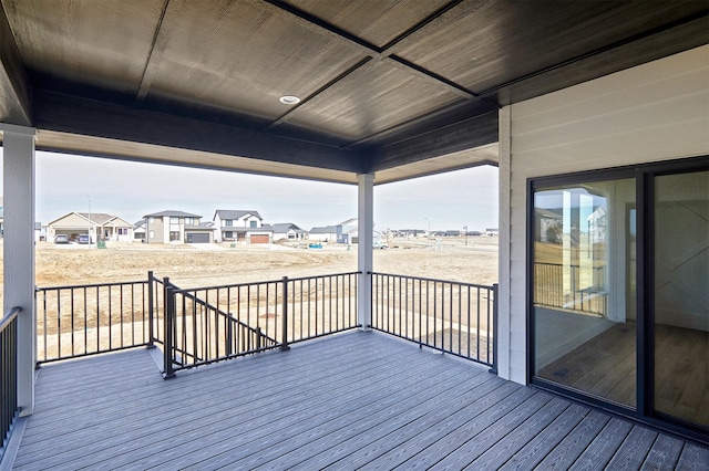 wooden deck featuring a residential view