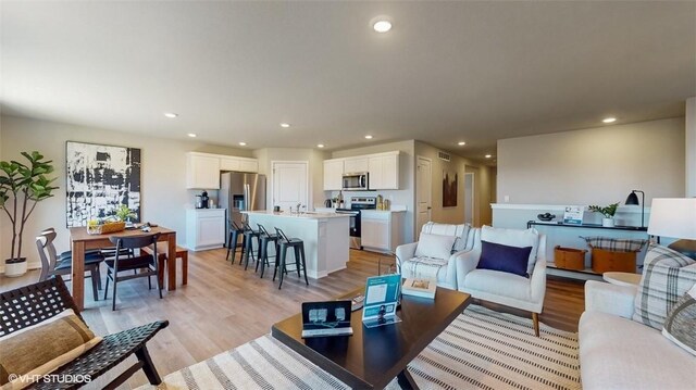 living room with light wood-type flooring