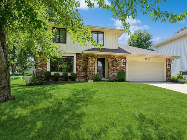 view of front of home with brick siding, a shingled roof, a front yard, a garage, and driveway