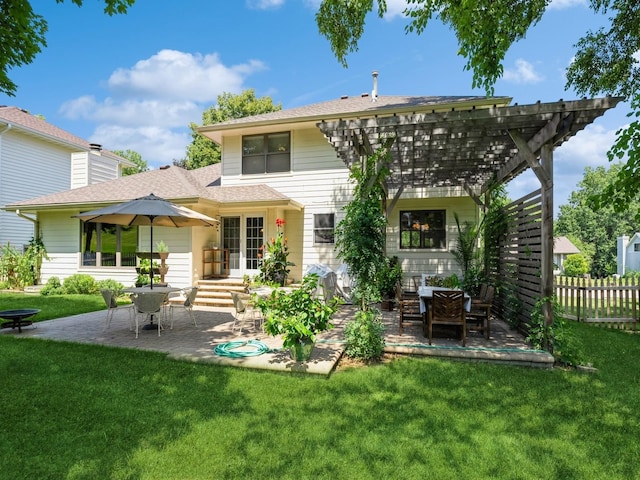 back of house with a yard, a patio, fence, and a pergola