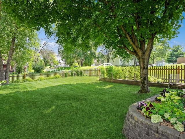 view of yard featuring a fenced backyard