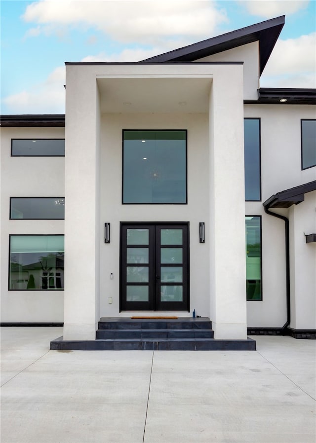 property entrance with french doors