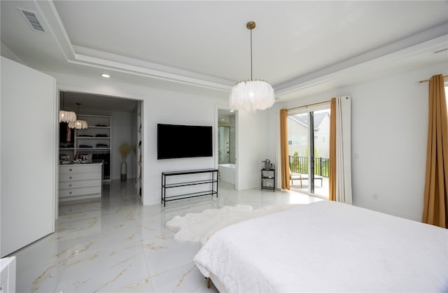 tiled bedroom with a walk in closet, access to outside, an inviting chandelier, and a tray ceiling