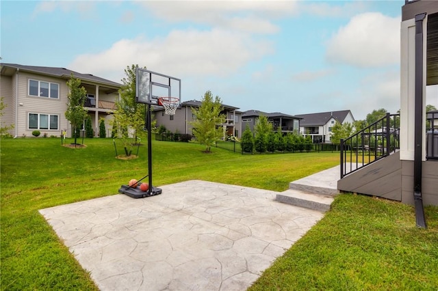 exterior space with a lawn and a residential view