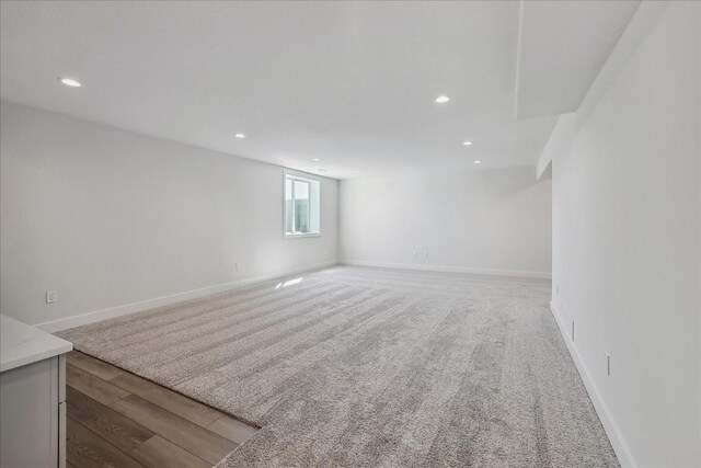 unfurnished room featuring hardwood / wood-style flooring