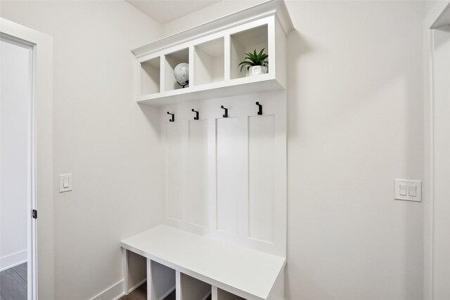 mudroom with dark hardwood / wood-style flooring