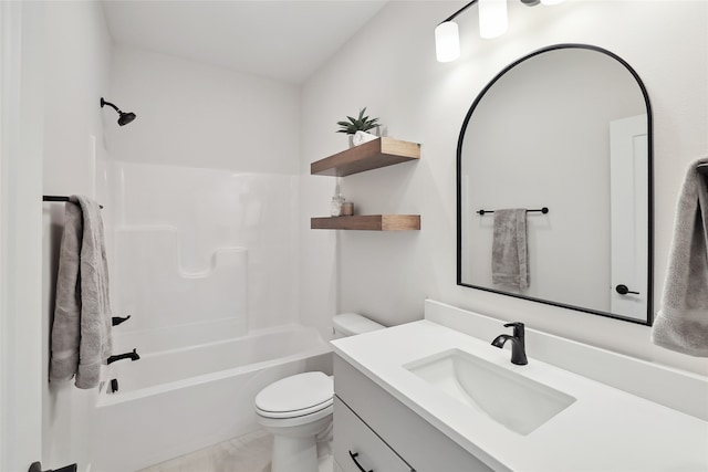 full bathroom with  shower combination, vanity, and toilet