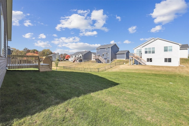 view of yard with a wooden deck