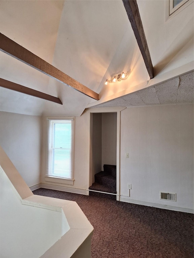 317 7th St, West Des Moines, IA 50265 - unfurnished living room featuring stairs and dark carpet