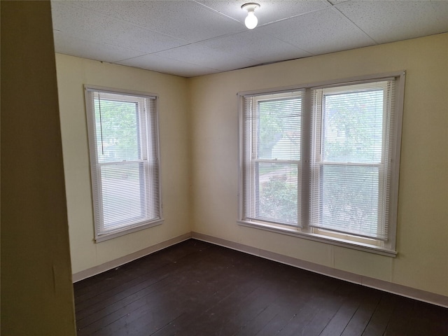 317 7th St, West Des Moines, IA 50265 - spare room with dark wood finished floors