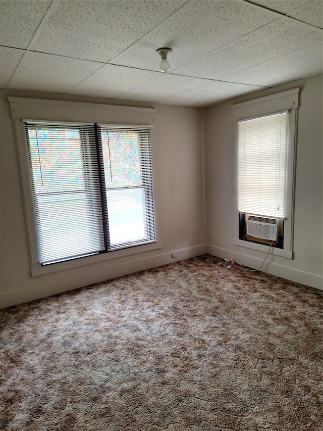 317 7th St, West Des Moines, IA 50265 - carpeted empty room featuring a drop ceiling, plenty of natural light, cooling unit, and baseboards