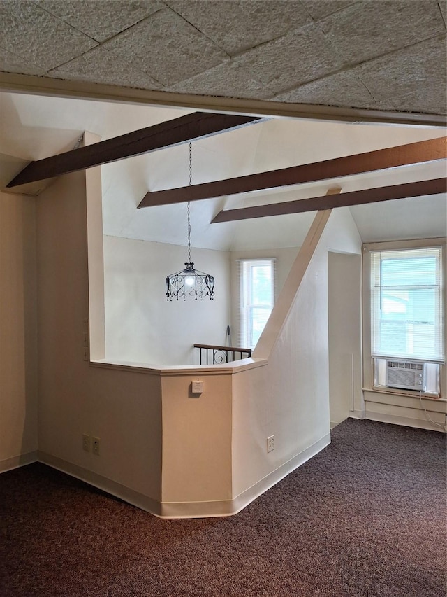 317 7th St, West Des Moines, IA 50265 - empty room featuring dark carpet, cooling unit, and baseboards