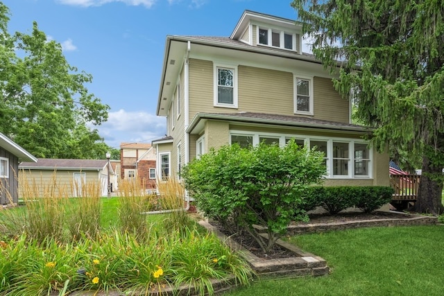 exterior space with a front yard