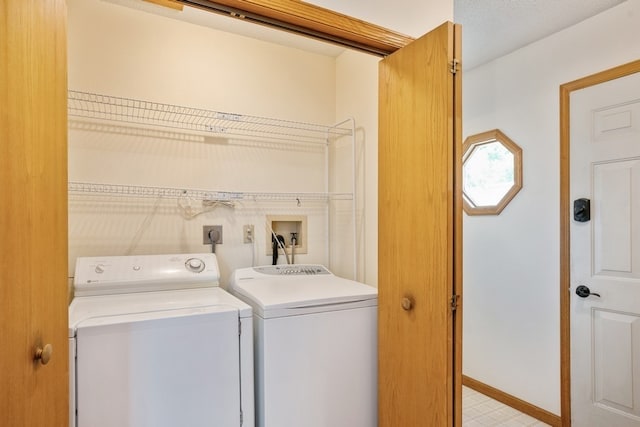 laundry room with separate washer and dryer