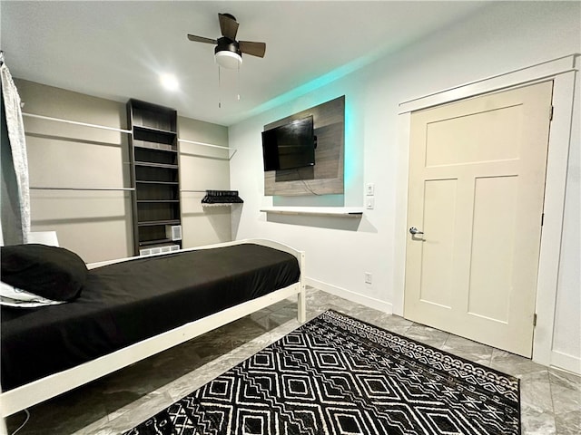 bedroom featuring ceiling fan