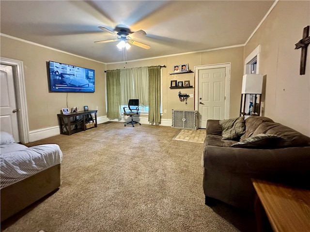 living room with ceiling fan, carpet flooring, and ornamental molding