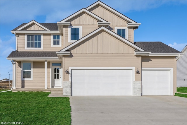 craftsman-style home with a front lawn and a garage