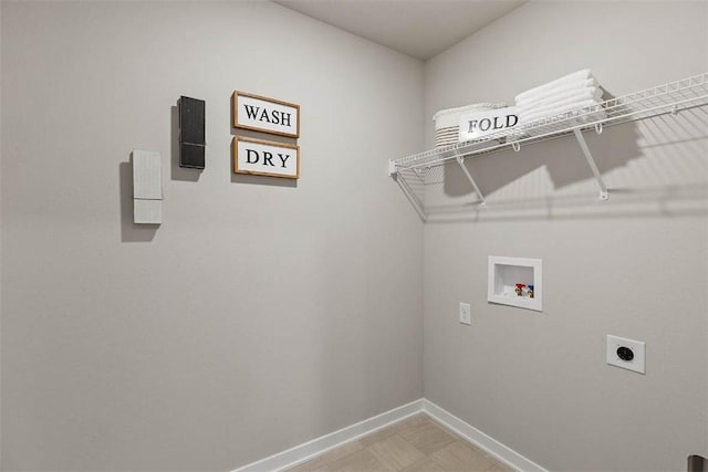 washroom with laundry area, hookup for a washing machine, electric dryer hookup, and baseboards