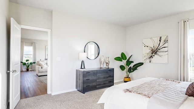 bedroom with light wood-type flooring