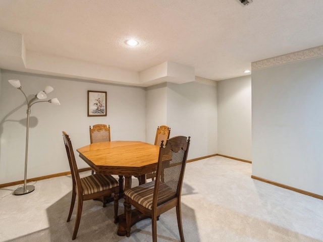 view of carpeted dining room