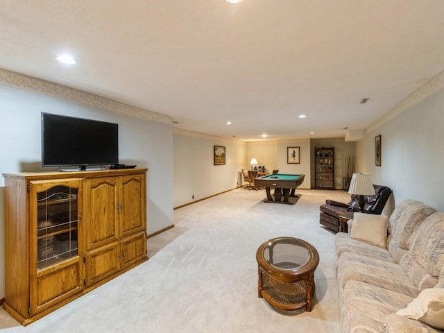 carpeted living room with ornamental molding and pool table