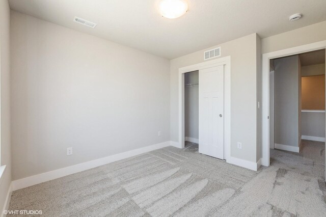 2304 Chan Dr, Adel, IA 50003 - unfurnished bedroom with carpet and a closet