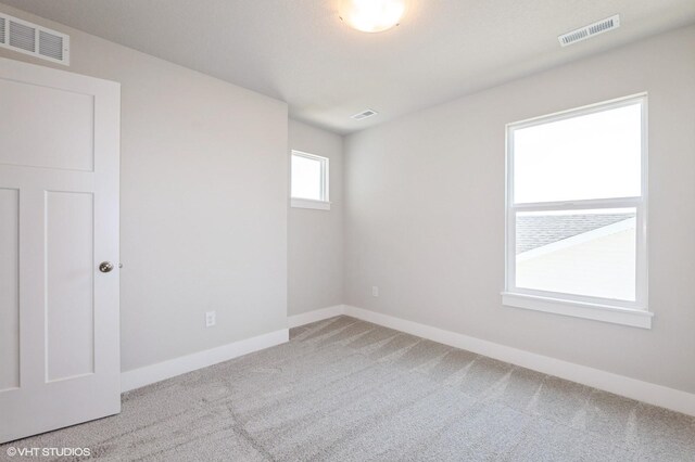 2304 Chan Dr, Adel, IA 50003 - unfurnished room with carpet flooring and baseboards