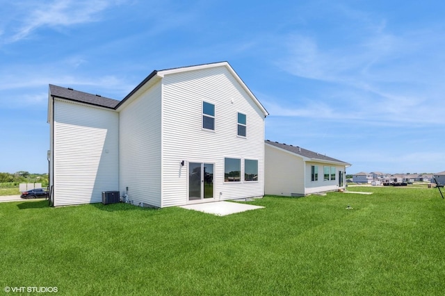2304 Chan Dr, Adel, IA 50003 - rear view of property featuring a yard and a patio