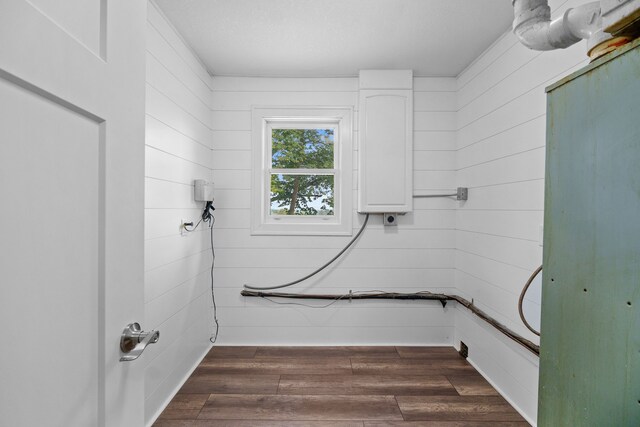 bathroom with hardwood / wood-style floors