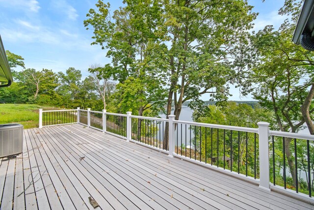 wooden terrace featuring central air condition unit