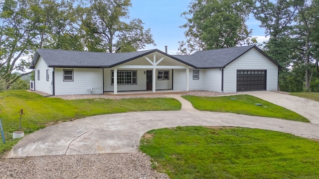 ranch-style home with an attached garage, driveway, a front lawn, and a porch