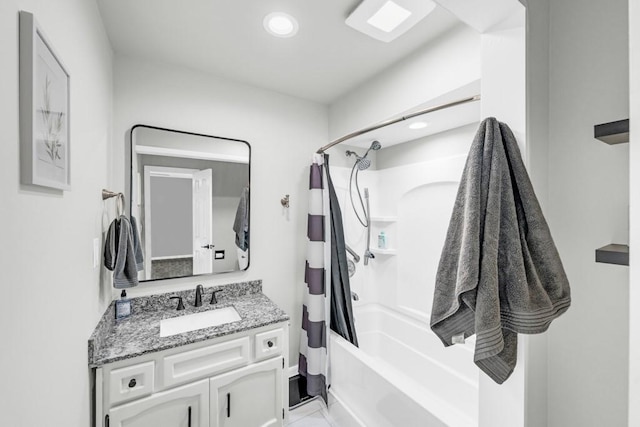 bathroom featuring recessed lighting, vanity, and shower / bath combo with shower curtain