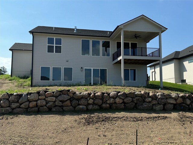 1185 NW 28th St, Grimes, IA 50111 - back of property featuring ceiling fan and a balcony