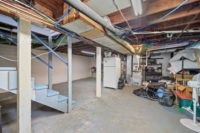 basement with white fridge