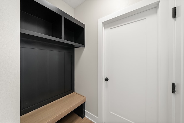 mudroom with hardwood / wood-style flooring