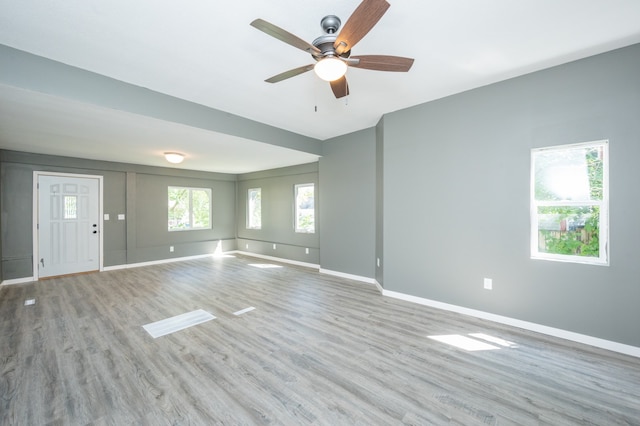 interior space featuring ceiling fan and light hardwood / wood-style floors