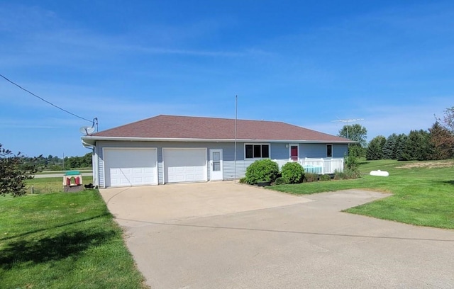 ranch-style home featuring a front yard and a garage