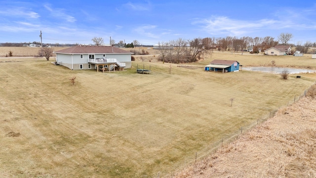 birds eye view of property featuring a rural view