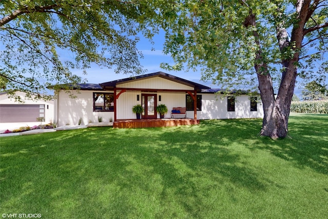 single story home with a front yard and a porch