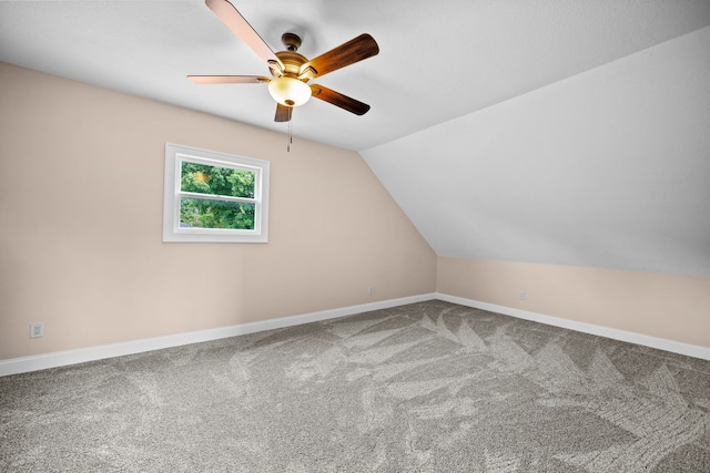 bonus room featuring carpet floors, lofted ceiling, and ceiling fan