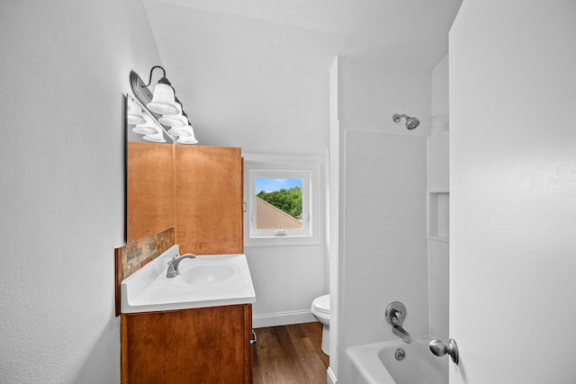 full bathroom with wood-type flooring, vanity, toilet, and bathtub / shower combination