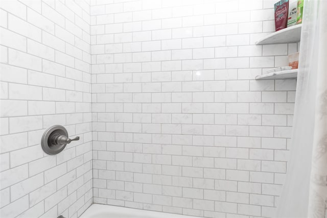 bathroom featuring shower / bathtub combination with curtain